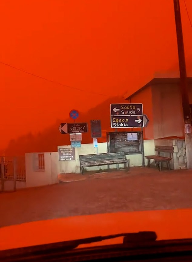 A deep haze has left the sky coloured in a dark orange causing severe visibility issues