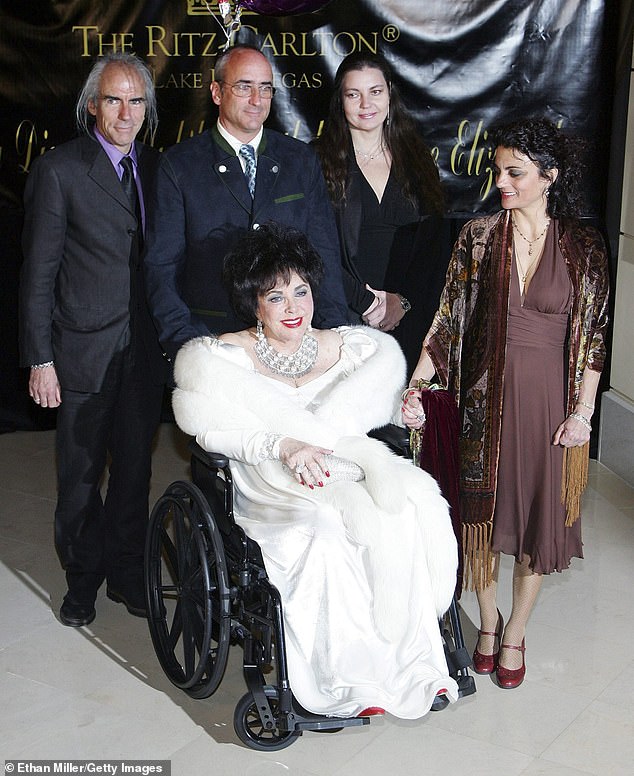 The child star-turned-Oscar winner with vibrant violet eyes died, age 79, in 2011 from congestive heart failure (pictured in 2007 with her four children)