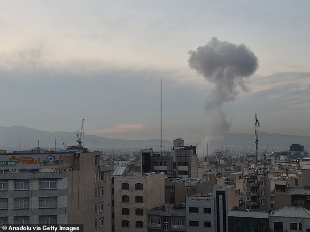 Smoke rises after explosions struck parts of Tehran, Iran amid Israeli strikes on Wednesday, ahead of President Donald Trump's address to the nation where he delivered an update on the war