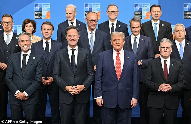 A leaders photo during a NATO summit in 2025 showing President Trump with Finland's President Alexander Stubb, Netherlands' Prime Minister Dick Schoof, France's President Emmanuel Macron, NATO Secretary General Mark Rutte, Greece's Prime Minister Kyriakos Mitsotakis, Britain's Prime Minister Keir Starmer, Hungary's Prime Minister Viktor Orban