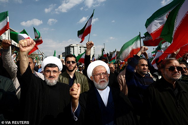 Iranian people attend funeral for Revolutionary Guards Navy Commander Alireza Tangsiri on April 1. The IRGC branded Mr Trump's claims they had asked for a ceasefire 'nonsense'