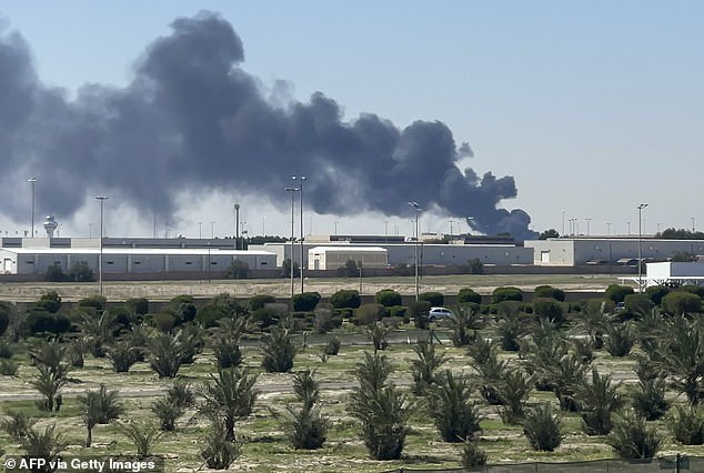 Smoke rises from an area of Kuwait's international airport after a reported drone strike on April 1
