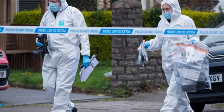 Three people arrested after schools plunged into lockdown during manhunt for gunman following shooting