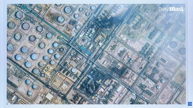 As well as striking US radar and command posts, Iran has added a third strategic target - the energy infrastructures of countries housing US bases. Pictured: Three smouldering sites visible at the oil refinery in Ras Tanura in Saudi Arabia,