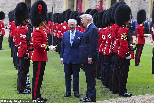 King Charles III and Donald Trump reviewing the guard of honour during Mr Trump's ceremonial welcome at Windsor Castle in September last year