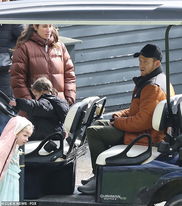The couple, who held a wedding ceremony in 2023, looked tense during the family day amid continuing rumours about their relationship