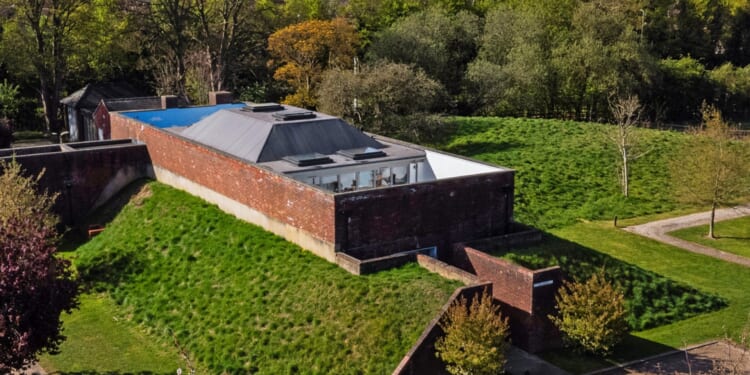 Old WWII bunker converted into incredible two-bedroom house with Love Island-inspired balcony hits market for £650k
