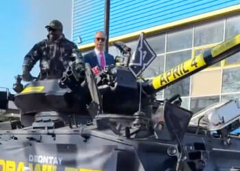 Derek Chisora rocks up at press conference in a TANK flanked by Nigel Farage ahead of retirement bout vs Deontay Wilder