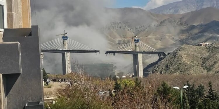 Eight killed in strike on Middle East's 'tallest bridge' hours after Trump vowed to bomb Iran 'into the stone ages'