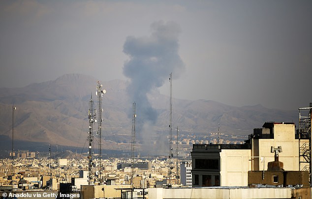 Smoke rises over residential area following the US and Israeli attack in Tehran, Iran on April 1