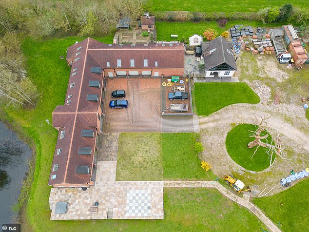 Dr Rooke argued the building was intended for a gym, workshop and garaging for a collection of classic cars, with its design including 10 large garage-style openings suggesting space for up to 10 vehicles