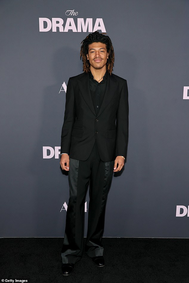 Henry looked sharp in an all-black suit