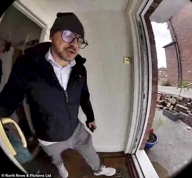 CCTV shows a man knocking on the front door of a property while speaking in Romanian, before leaving