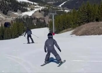 Meghan shares adorable video of Archie, 6, skilfully skiing with dad Prince Harry as she says he's a 'quick learner'