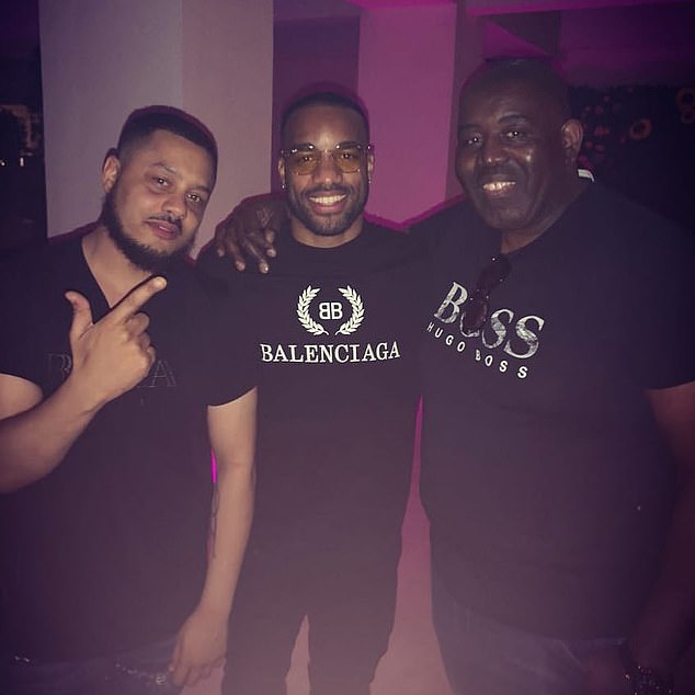 Troopz and Lyle with Arsenal striker Alexandre Lacazette in 2019