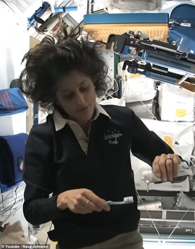 NASA astronaut Sunita 'Suni' Williams (pictured), shows how to brush your teeth while in space. Long gone are luxurious showers - with a more humble wash rag required for a quick wash