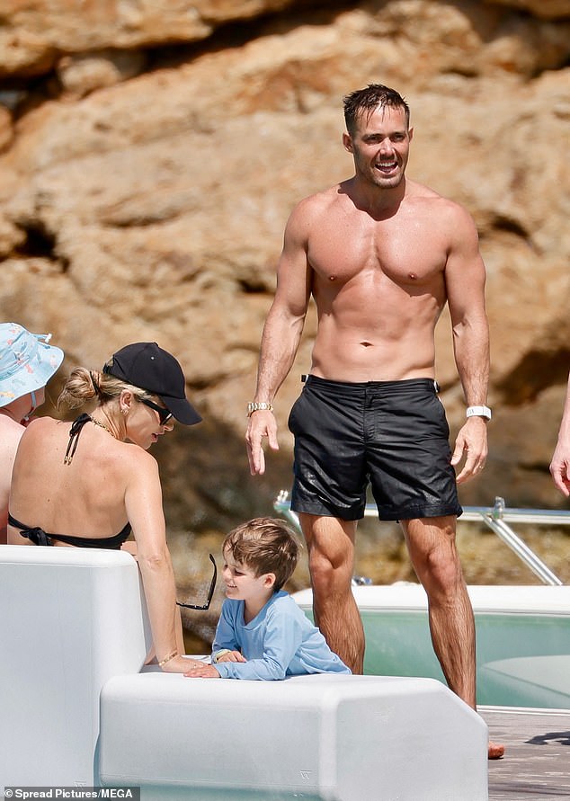 He went shirtless in swimming trunks