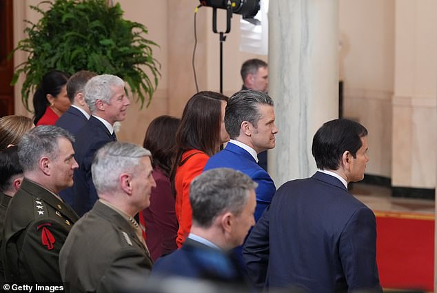 Secretary of War Pete Hegseth, center, and Secretary of State Marco Rubio, right, attend Trump's address to the nation on the war in Iran