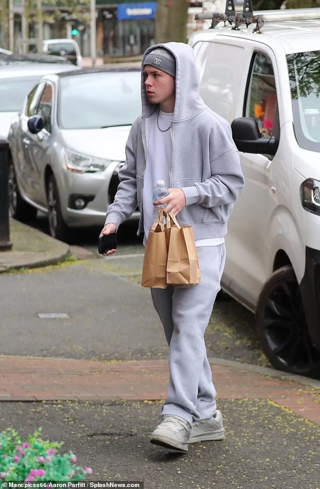 The footballer, was spotted having a trim while a marquee was set up for the beautiful and boozy' celebrations at the family's nearby £20M mansion