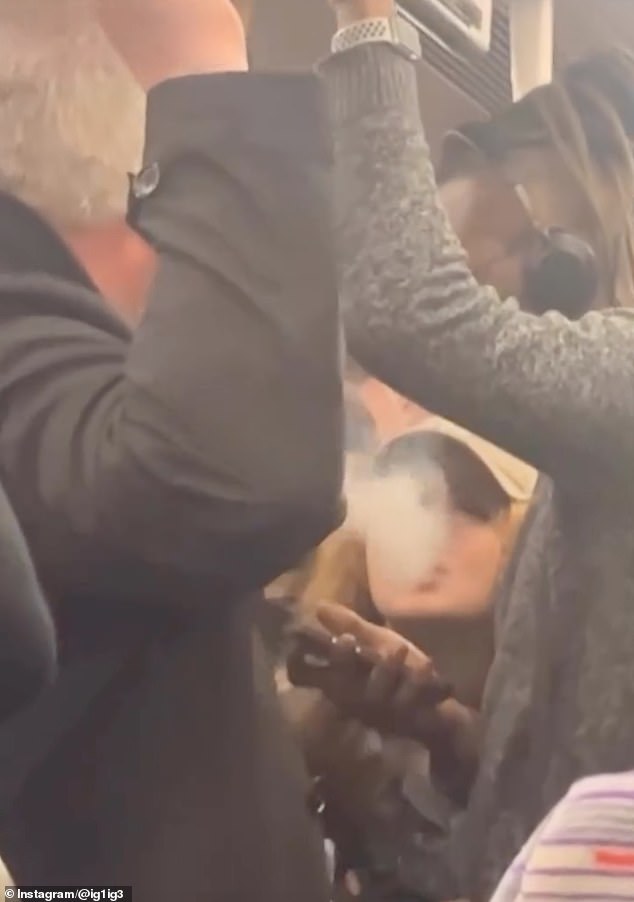 A vaping girl ignores the man's request for her to stop and instead exhales smoke towards him