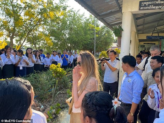 Jolie visited the Samlout High School to inspect student living conditions and explore introducing STEM education. She reviewed dormitory facilities and discussed potential academic, technology, and engineering programs with staff