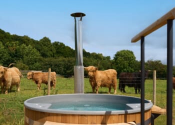 I stayed at the Cotswolds-esque hotel that shares its outdoor spa with Highland cows