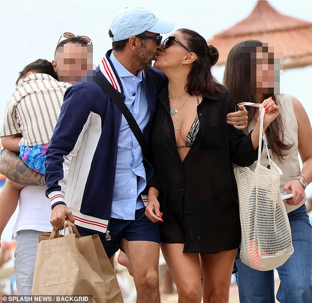 With almost everything on display, the actress couldn¿t keep her hands off her handsome husband as they stayed close, sharing multiple passionate kisses throughout their day in the sun
