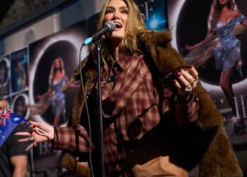 Delta Goodrem reveals plans for first album in five years ahead of Eurovision debut as she performs pop-up gig in London