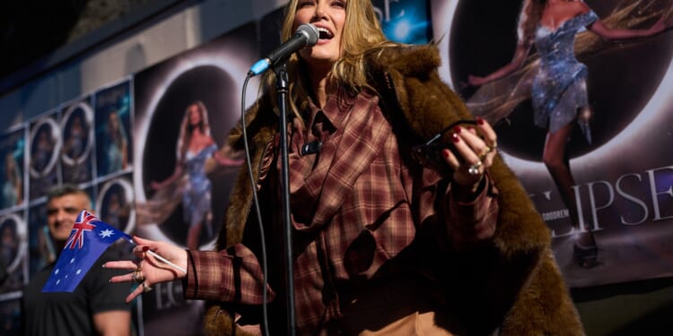 Delta Goodrem reveals plans for first album in five years ahead of Eurovision debut as she performs pop-up gig in London