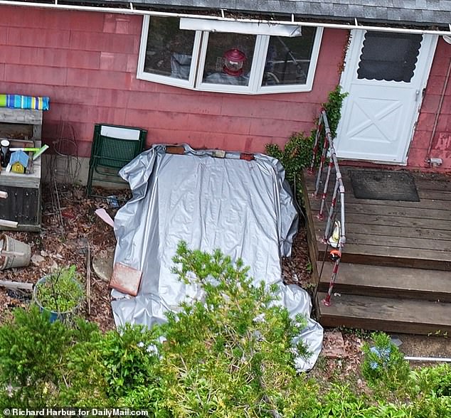 The backyard of Rex Heuermann's home in Massapequa Park during a search in June 2024
