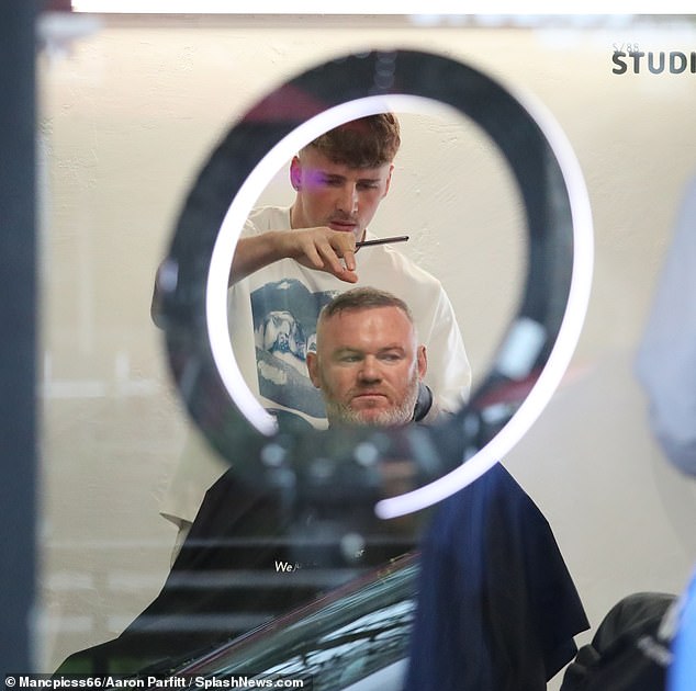 Elsewhere on Friday, Wayne and lookalike son Kai headed to the barbers in Cheshire ahead of the party