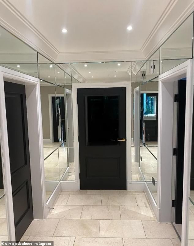 The design expert added that the space leans heavily into 'glossy finishes, mirrored surfaces, reflective materials and display style shelving'