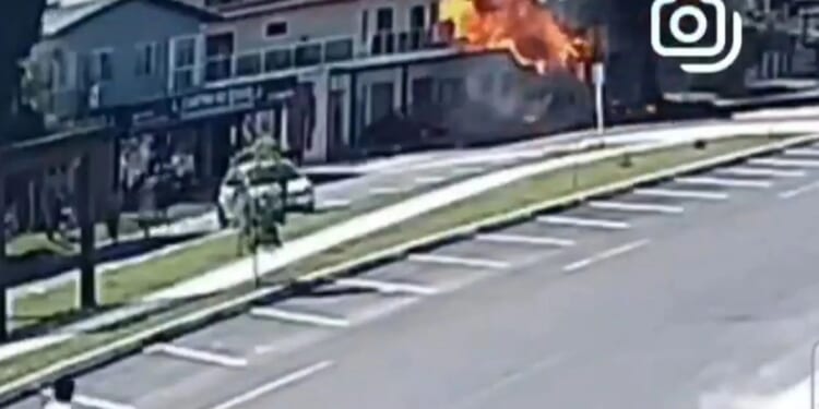 Terrifying moment plane smashes into restaurant and bursts into flames killing four