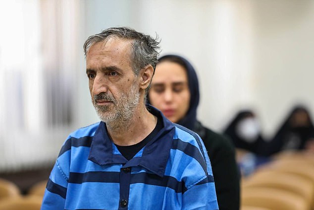 Another sentenced to death is Mohammad Abbasi (pictured), 55, who was convicted of Moharebeh over the killing of a police colonel, while his distraught 33-year-old daughter (pictured behind Mr Abbasi), Fatemeh, looked on in court