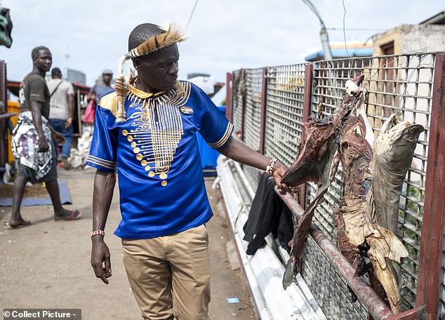 Pictured: Jabulani Sambo, a Sangoma and Nyanga who operates out of the Warwick Junction Muthi market