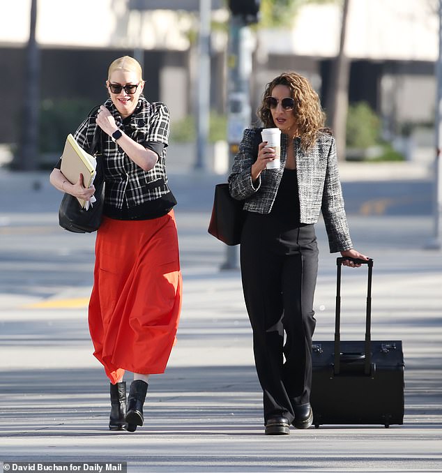 Evans (pictured left close to the Los Angeles courthouse) is seeking an increase in the $1,500 a month her ex pays her, while he is asking a judge to end spousal support altogether