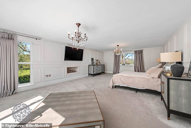 One of the bedrooms in Helen's home. Agents Miller Metcalfe say of the house: 'An exceptional and beautifully presented detached family residence, offering over 5,000 sq. ft of luxurious living space'
