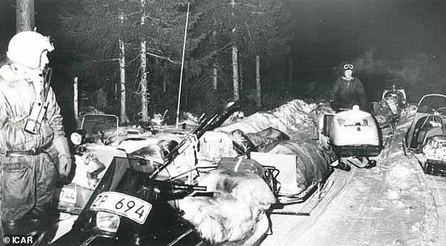 Rescuers transport the bodies down the mountain on sledges pulled by jet skis