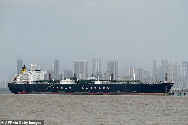 Pictured: An Indian ship moves through the Strait of Hormuz on April 1, 2026. Iran has set up a selective blockade, only allowing 'friendly' nations through