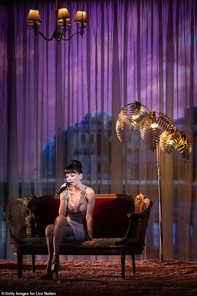 Flaunting her long, toned legs, Lily sang her heart out on stage as fans sang along with her