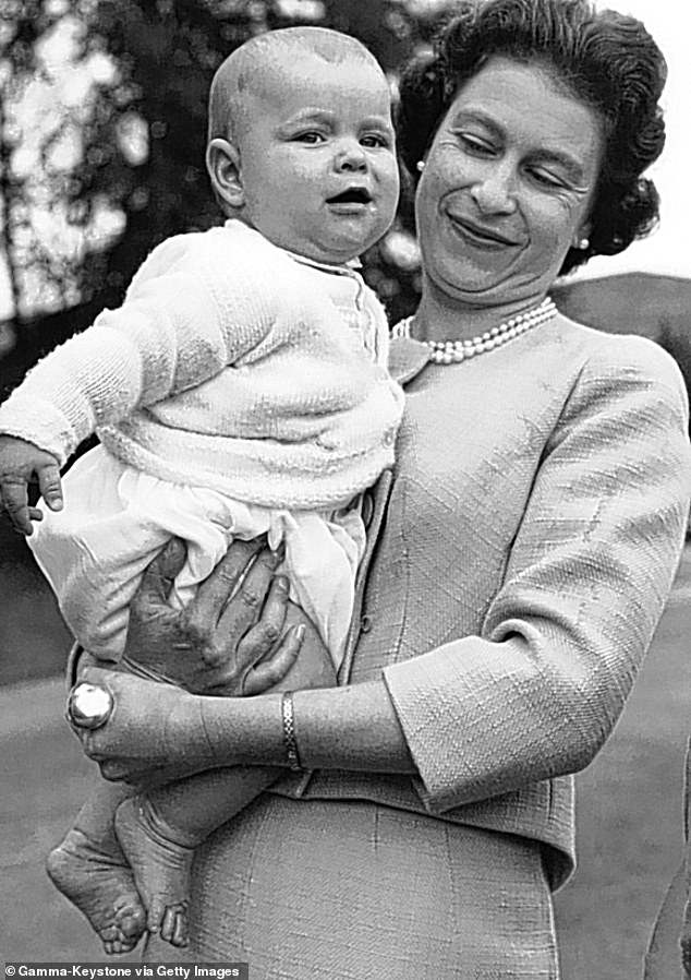 Queen Elizabeth with baby Andrew at Balmoral in 1960 – the year of his birth
