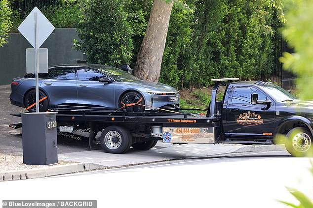 It remains unclear whether the car was being towed for repairs or for another reason