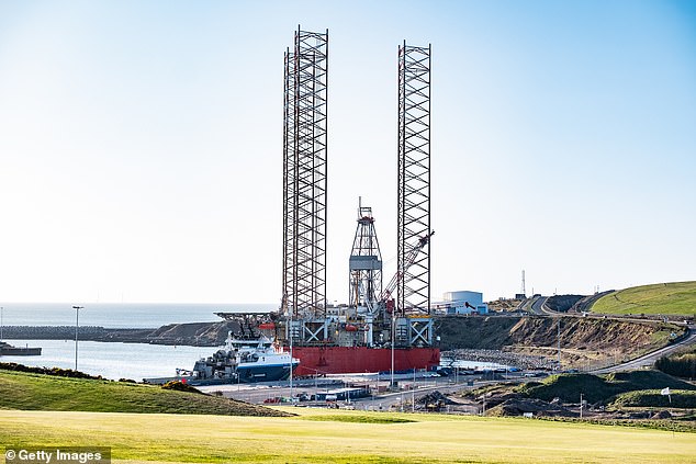 But the Tories and Reform have called for the Energy Secretary to reverse his 'ideological' opposition to accessing the three billion barrels of oil and gas, which are worth about £165billion. Pictured: The Well-Safe Protector oil rig in Aberdeen