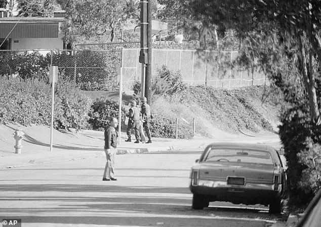Wiegand told her he was a reporter and wanted to ask a few questions. Brenda (pictured, when later escorted away by police) agreed to chat and the two began an extraordinary conversation in which she openly confessed what she had done