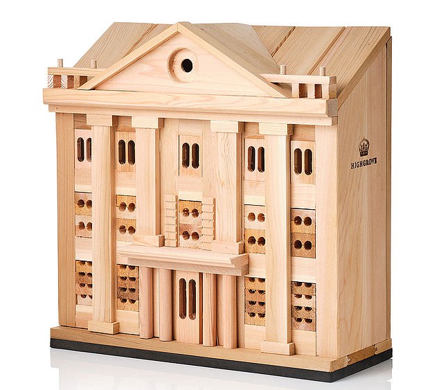 The £295 Highgrove Insect Hotel (pictured) is a miniature replica of His Majesty's residence, Highgrove House