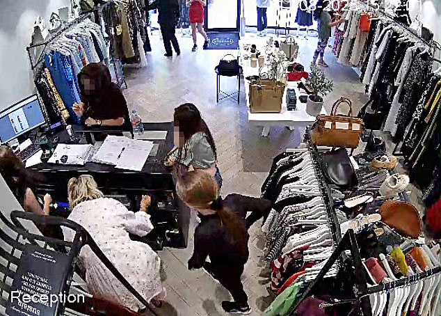 In a previous theft (pictured) ¿ this time back at the Cobham shop ¿ two young girls swiped the security tag remover kept under the counter