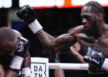 Deontay Wilder suffers suspected broken hand in Derek Chisora fight and claims he 'held back' from going for KO