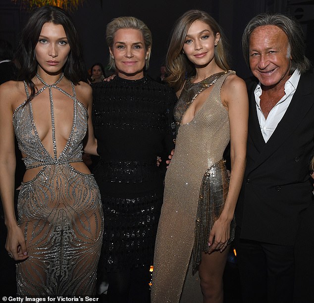 Hadid expressed to the fan that she 'grew up privileged' but added her parents 'protected me and taught me the value of hard work'; Hadid seen with sister Bella and parents in 2016 in Paris