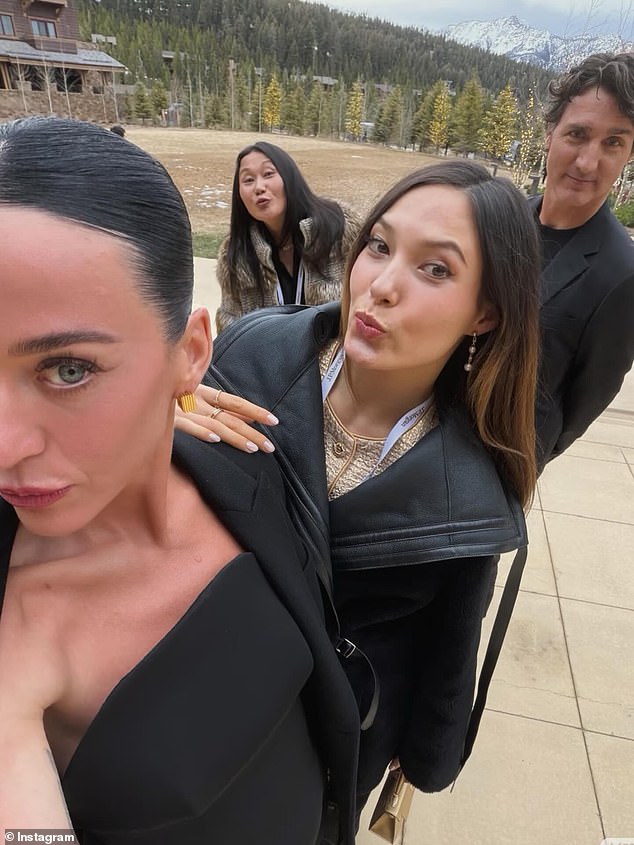 Additional photos included in Gu's Instagram carousel offered a further glimpse into her travels, the food she's been eating and the quality time she's spent with friends - including Trudeau's girlfriend, Katy Perry (L)
