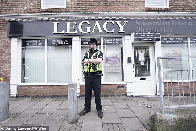 He had previously pleaded guilty to presenting families with the ashes of strangers and fraudulently selling funeral plans. Pictured: Police outside his funeral parlour in 2024